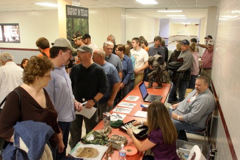 Craig Woolheater and Dalinda Colyer work the admission table as the doors open for the 2008 Texas Bigfoot Conference at the Jefferson High School. Photo: Alex Diaz