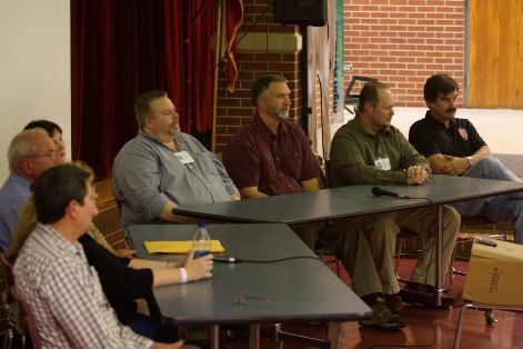 Alton Higgins, Kathy Moskowitz Strain, Henner Fahrenbach, Dana Holyfield, Craig Woolheater, Jeff Meldrum, Daryl Colyer and David Paulides take questions during the panel discussion, moderated by Brian Brown. Photo: Alex Diaz