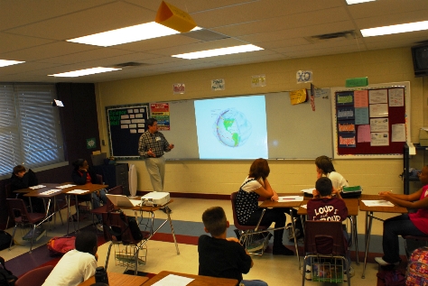 Professor Alton Higgins gives his presentation to seventh grade students in the Jefferson Independent School District, located in Jefferson, Texas. Photograph by Chris Buntenbah.