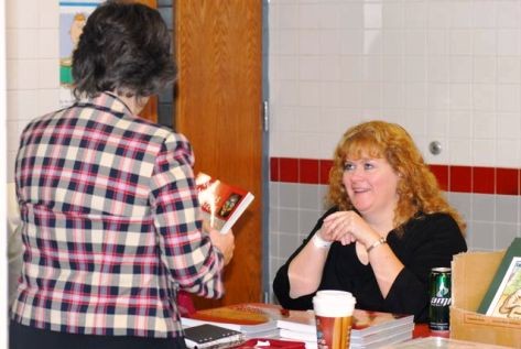 Kathy Moskowitz Strain sells her new book Giants, Cannibals and Monsters. Photo: Chris Buntenbah