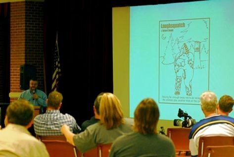 Robert Swain presents his drawings from Laughsquatch. Photo: Chris Buntenbah